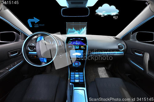 Image of car salon with navigation system and meteo sensors