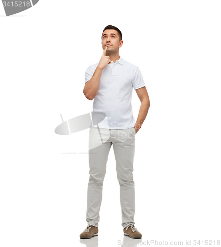 Image of man thinking and looking up