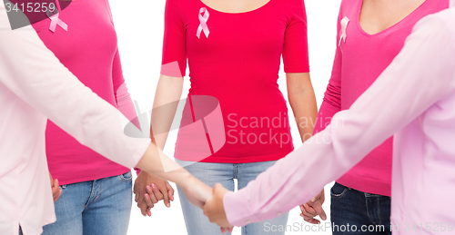 Image of close up of women with cancer awareness ribbons