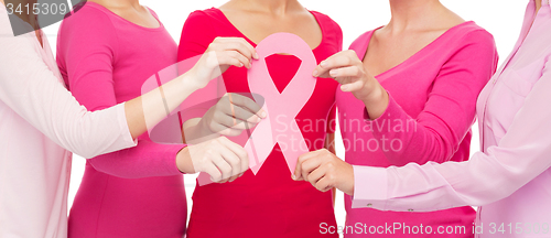 Image of close up of women with cancer awareness ribbons