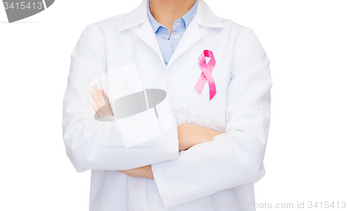 Image of female doctor with breast cancer awareness ribbon