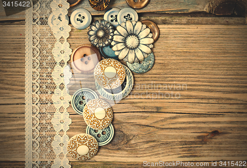 Image of vintage button and lace tape