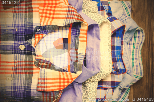 Image of shirts in pile