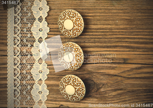 Image of vintage button and lace tape