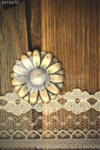 Image of vintage button and lace tape