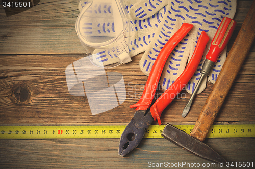 Image of old tools on aged boards