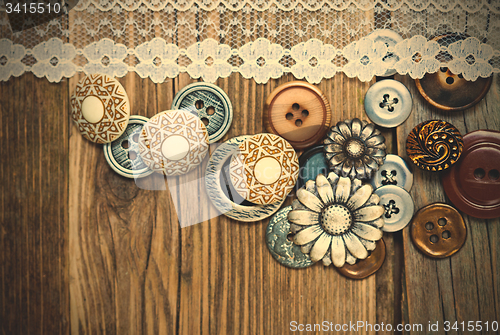 Image of vintage button and lace tape