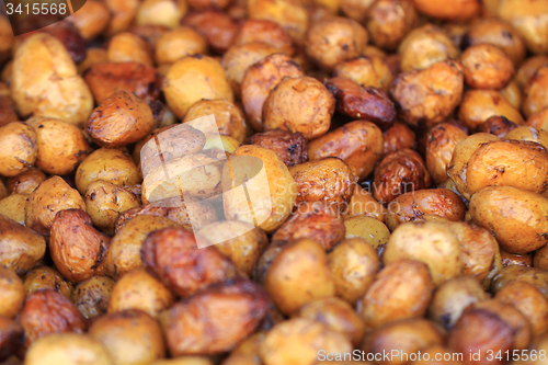 Image of whole grilled potatoes
