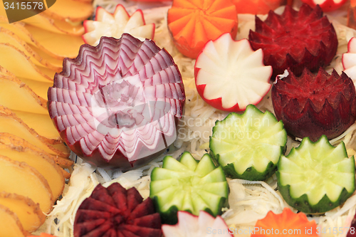 Image of vegetable decoration from cucumber, carrot
