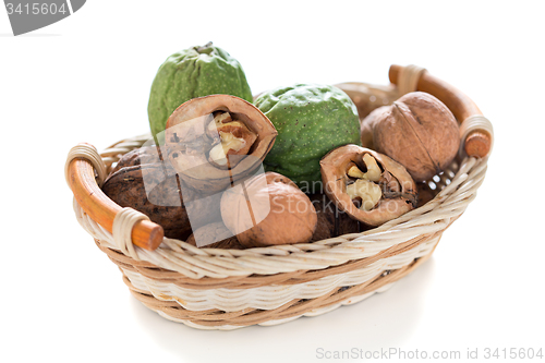Image of Walnuts in a wicker basket.