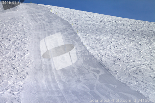 Image of Ski slope at sun evening