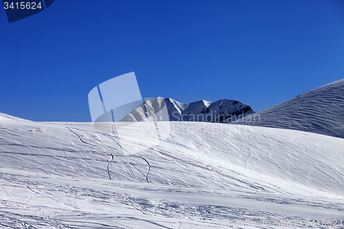 Image of Ski slope in sun morning