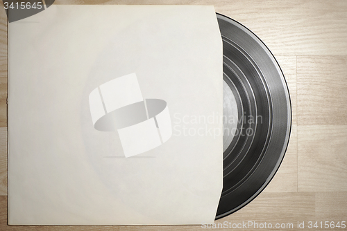 Image of Vinyl record with cover