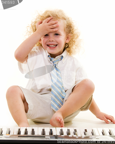 Image of Little piano player