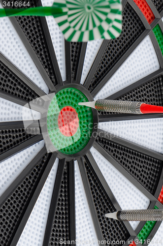 Image of Dart board with darts