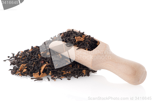 Image of Black Dry Tea with a Wooden Spoon