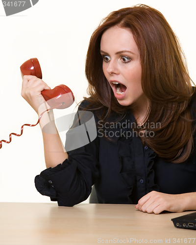 Image of Yelling into the phone