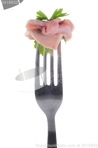 Image of Slice of ham skewered on a fork 