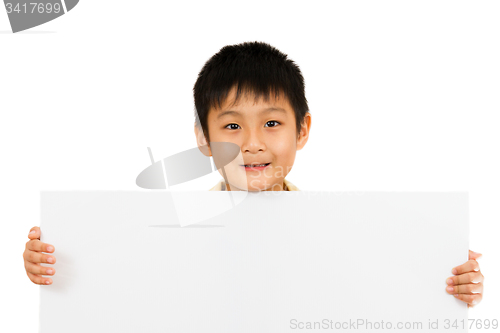 Image of Asian Chinese Children Holding blank white board.