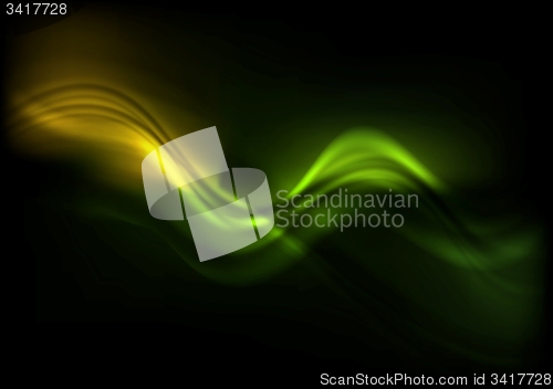 Image of Green orange wavy design on black background
