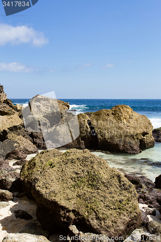 Image of rock formation on coastline at Nusa Penida island 