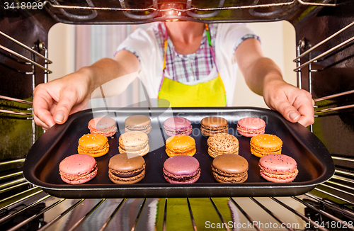 Image of Baking macarons in the oven.