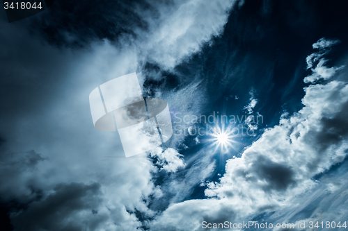 Image of sky with clouds and sun