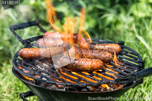 Image of Grilling sausages 