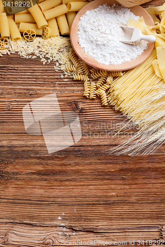 Image of Raw pasta on wood