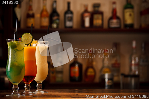 Image of Three tropical mixed drinks