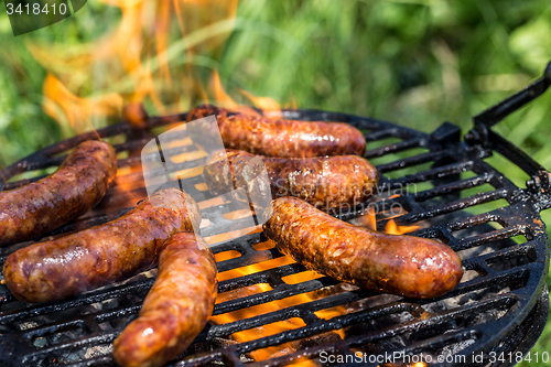 Image of Grilling sausages