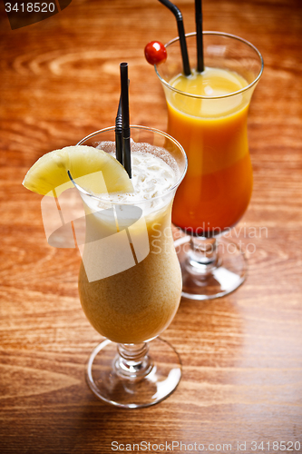 Image of Two fruity cocktail drinks
