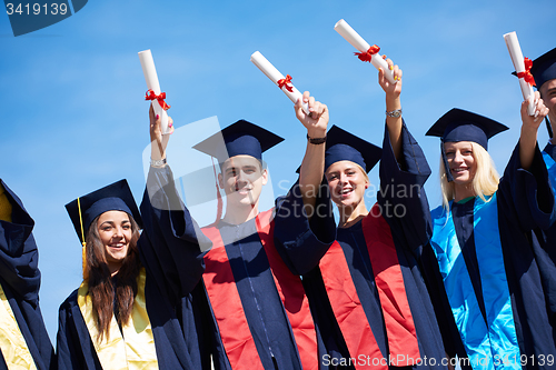 Image of young graduates students group