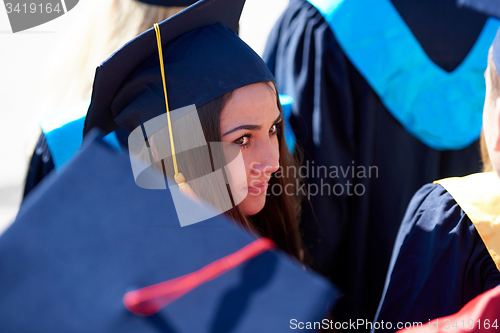 Image of young graduates students group