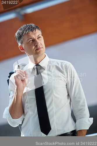 Image of business man using phone