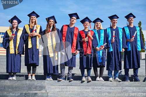 Image of young graduates students group