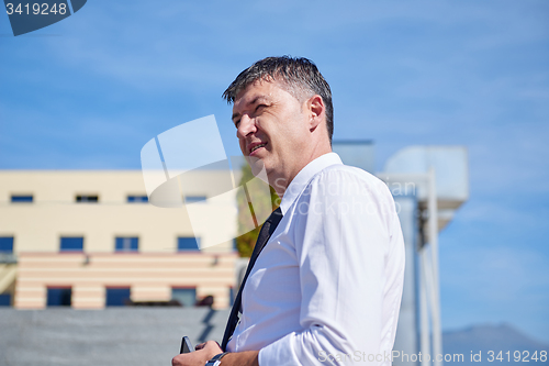 Image of businness man portrait outdoors