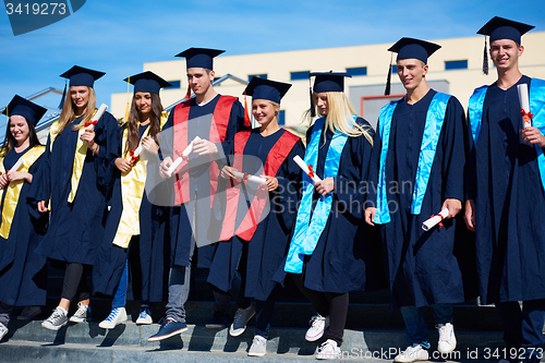 Image of young graduates students group