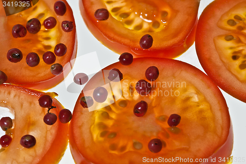 Image of Tomatoes slices and red pepper