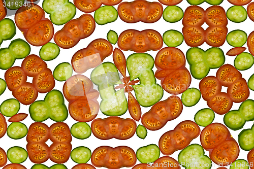 Image of Vegetable kaleidoscope composition slices with tomatoes and kiwi