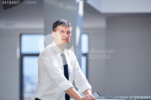 Image of business man using phone