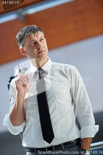 Image of business man using phone