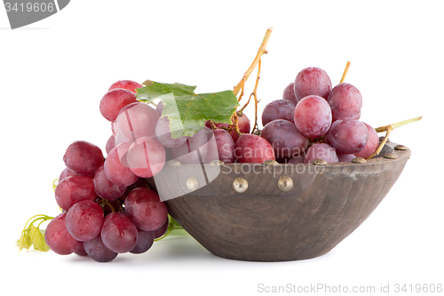 Image of Fresh red grapes in wood bown