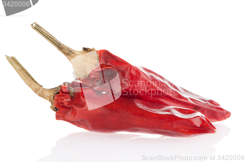 Image of Two red hot chili pepper