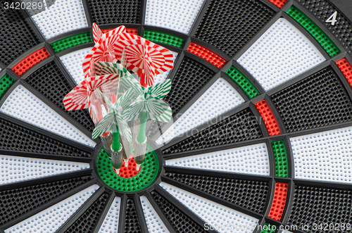 Image of Dart board with darts