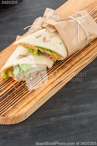 Image of Tortilla with chicken and vegetables