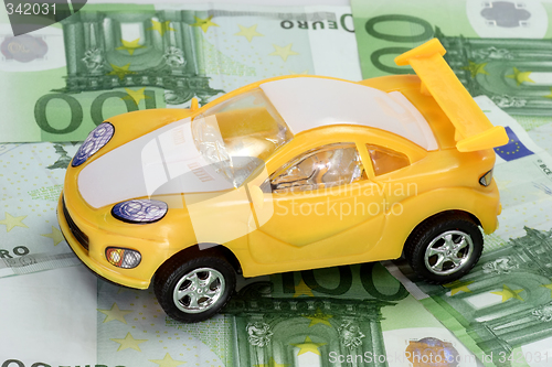 Image of Toy Car on Euro Banknotes