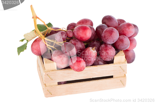 Image of Red grapes in wooden crate