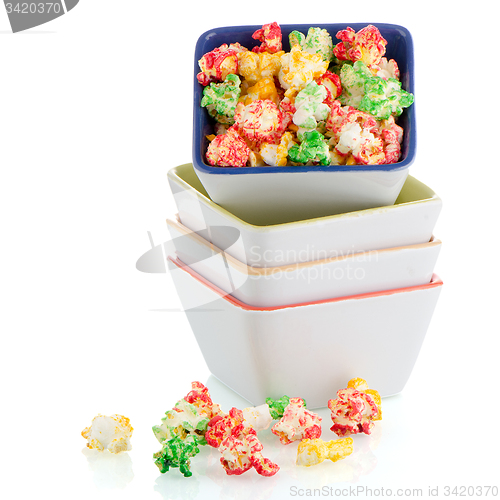 Image of Pile of ceramic bowls of popcorn