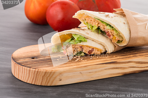 Image of Tortilla with chicken and vegetables